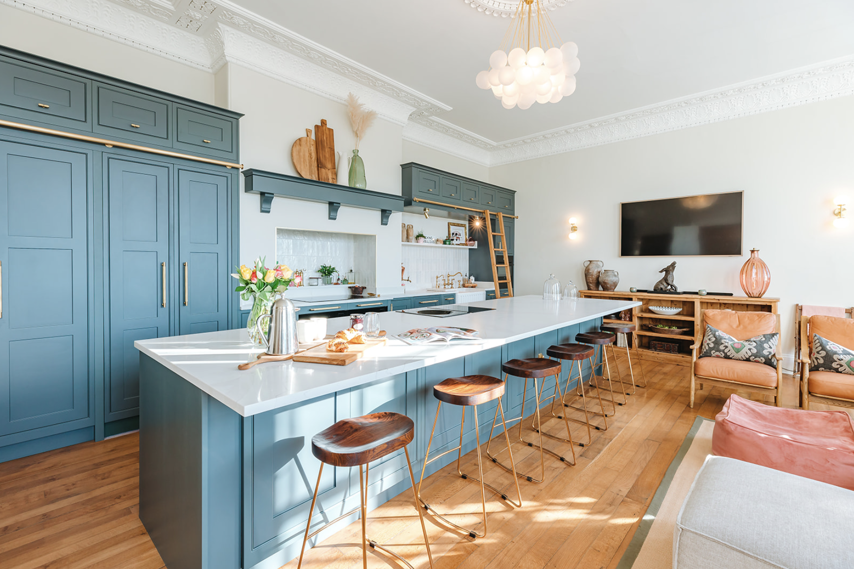 Bicton Hall: teal inframe kitchen beneath the original cornicing of a Georgian drawing room