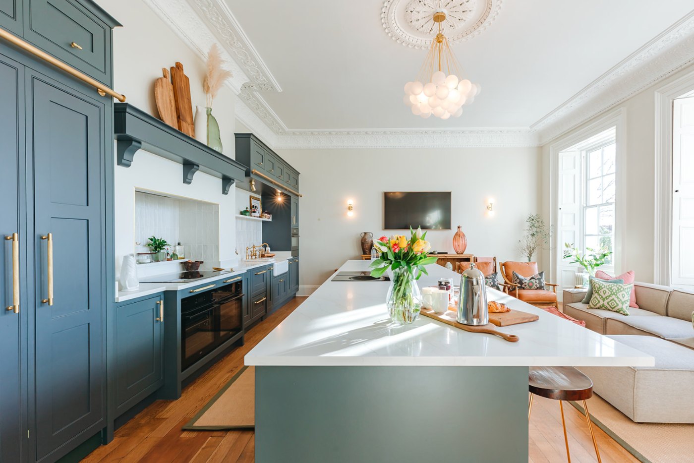 The kitchen at Bicton Hall, created inside a former Georgian drawing room with its high ceiling and tall windows retained