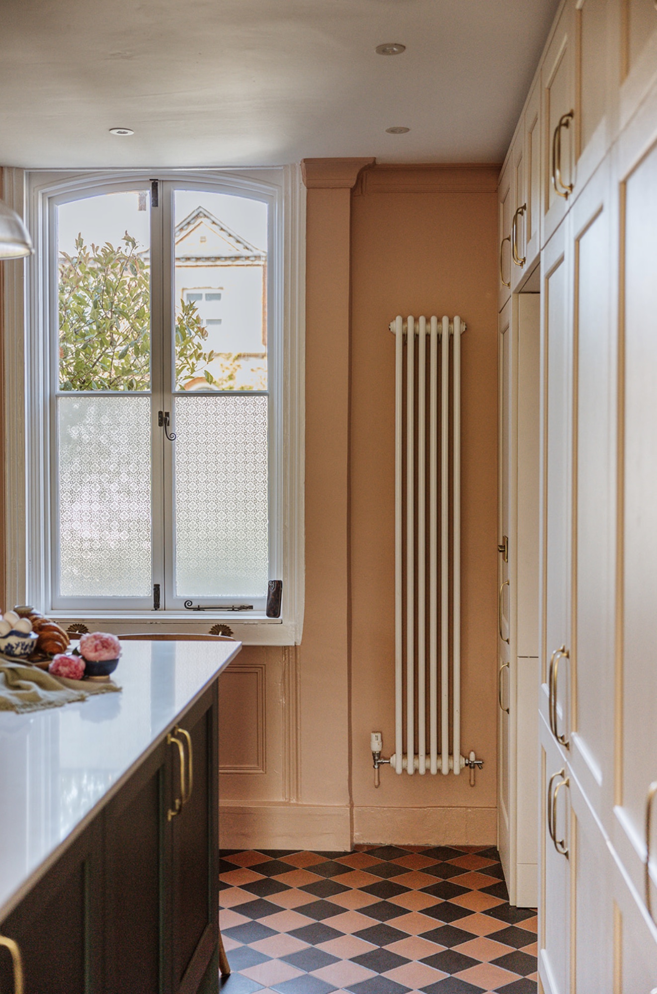 Oak Street kitchen worktop and drinks area with garden beyond